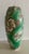 This is a vintage Japanese porcelain vase featuring hand-painted floral motifs and raised gold moriage accents on a green-...