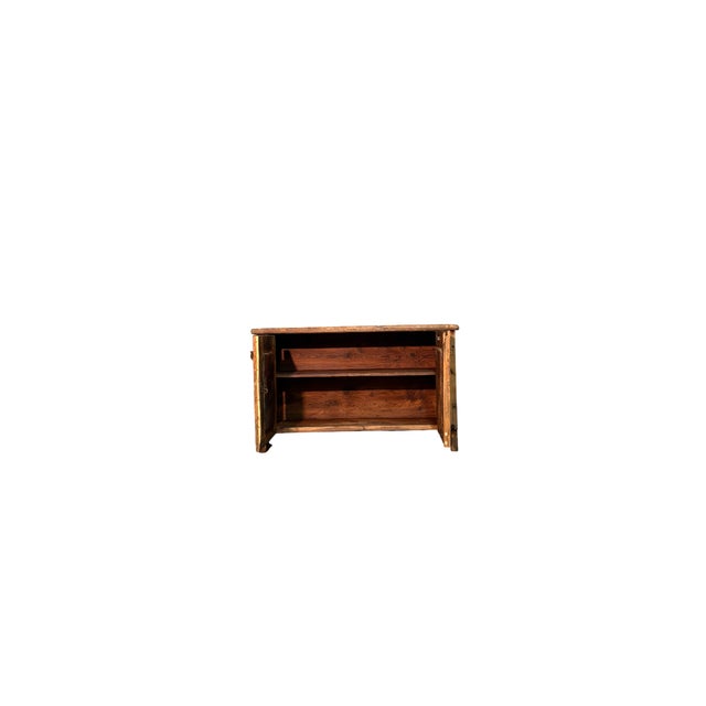 Rustic larch sideboard dating back to the 19th century, featuring two doors. Compact yet surprisingly roomy, it combines...