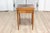 This 19th-century French game table is a masterful blend of form and function, showcasing the exquisite craftsmanship...