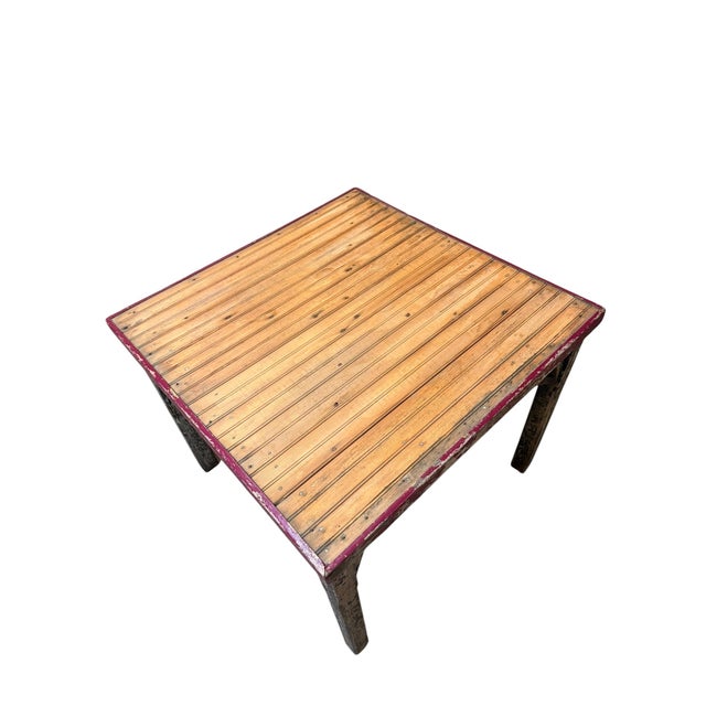 Bring authentic early 20th century Tavern Americana into your home with this antique wooden game table, sourced from our...