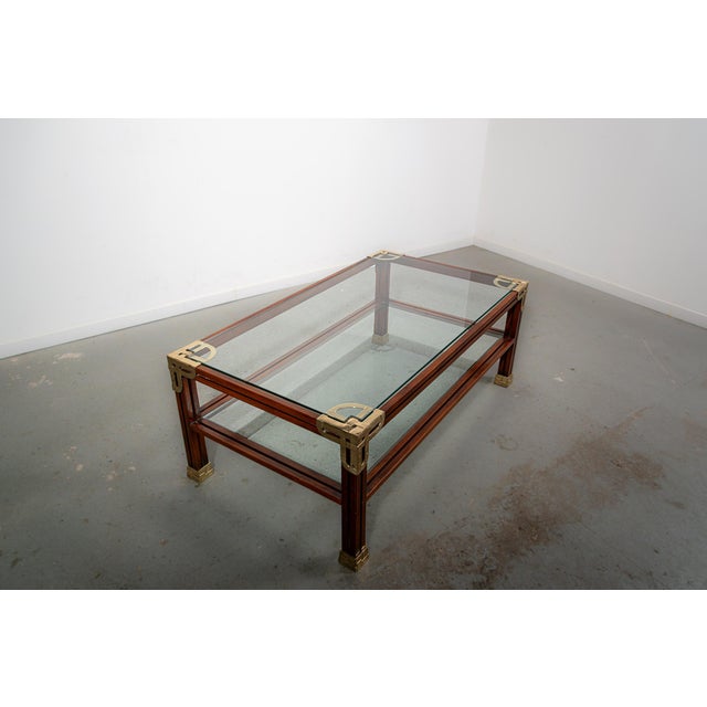 Crafted in the captivating era of the 1990s in Spain, this exquisite two-tier coffee table showcases a grand scale that...