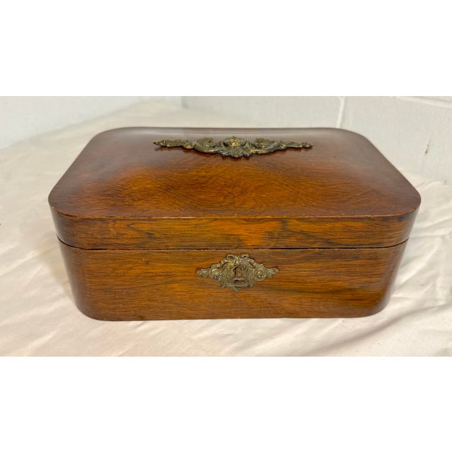 Up for sale is an exquisite antique 19th century handmade bronze mounted veneered wood writing lap desk. The desk features...