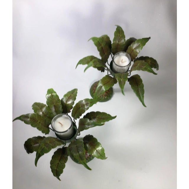 These vintage cast spelter/zinc painted toleware candleholders, by Petite Choses, make a great centerpiece - with votive...