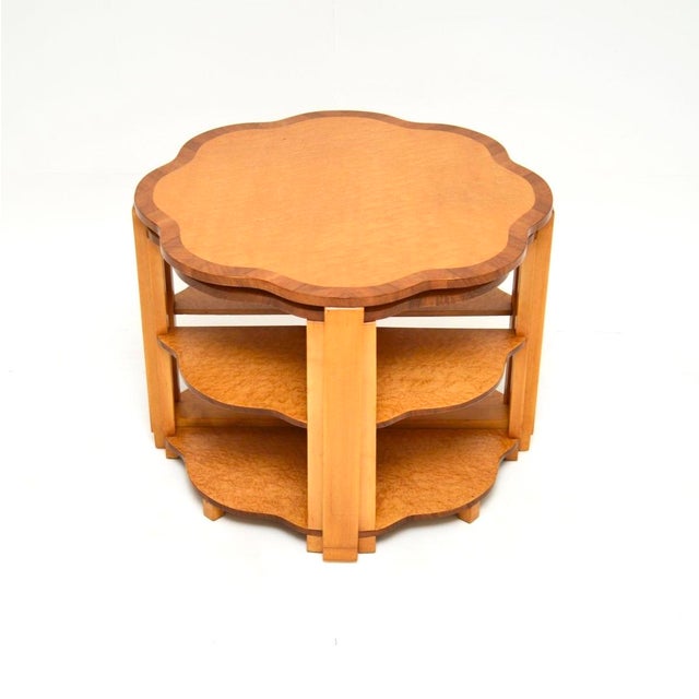 A gorgeous and extremely well made Art Deco birds eye maple nesting coffee table. This was made in England, it dates from...