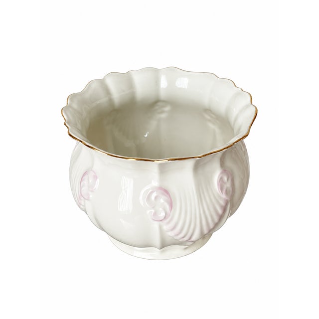 An elegant Belleek Georgian Shell cachepot crafted in Ireland from ivory Parian porcelain. Its rounded, gently paneled...