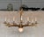 Spanish Spanish 1950’s Gilt Iron Twelve-Arm Chandelier With Opaline Glass Center Light For Sale - Image 3 of 18