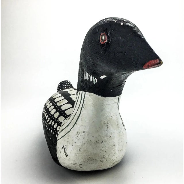 Beautiful black and white hand carved and hand painted artisan wooden Duck. I haven’t tried to see if he floats, but...