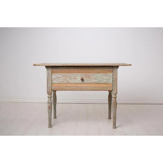 Antique folk art table from Sweden dated 1862. Made by hand in solid pine with the original first layer of paint. The...