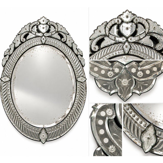 Elegant large Venetian-style oval wall mirror featuring an ornate mirrored frame, beveled glass edges, delicate etched...