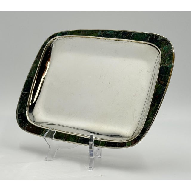 A striking example of mid-century Mexican modernist silverwork, this vintage serving tray was designed and manufactured by...