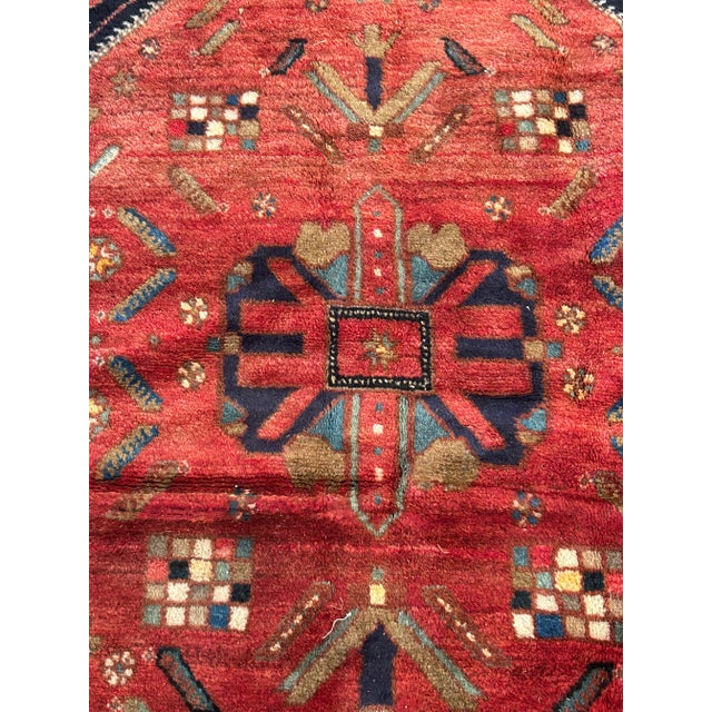 Gorgeous jewel toned plush vintage rug with rich navy blue and raspberry .