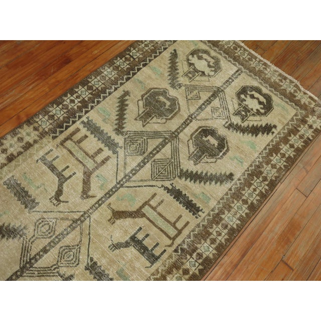 One of a kind, mid 20th-century Hand-knotted Persian Tribal Runner with a pictorial design. Professionally Washed &...