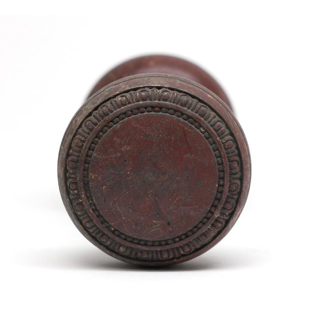 Bronze concentric design doorknobs with a dark antique patina. The manufacturer and date of creation is unknown. Priced as...