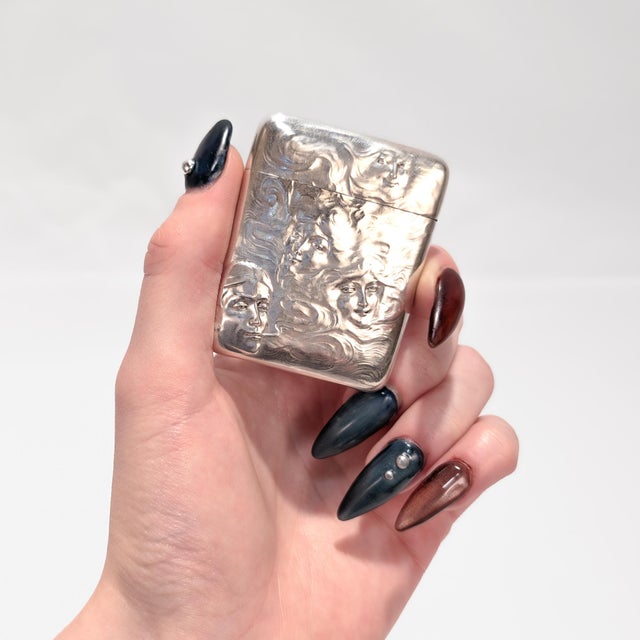 A fine antique signed silver Art Nouveau cigarette & cigar themed matchsafe. By R. Blackinton & Co. In sterling silver....