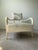 A striking pair of Bernhardt Interiors Elka accent chairs featuring a sculptural silhouette, luxurious ivory-white hair-...