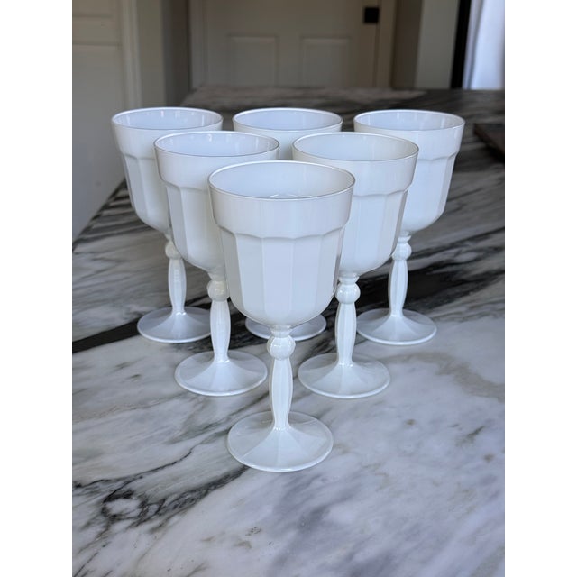 Here is a set of white glass goblets made in London in the Florentine Renaissance style. Ideal for all occasions! To view...