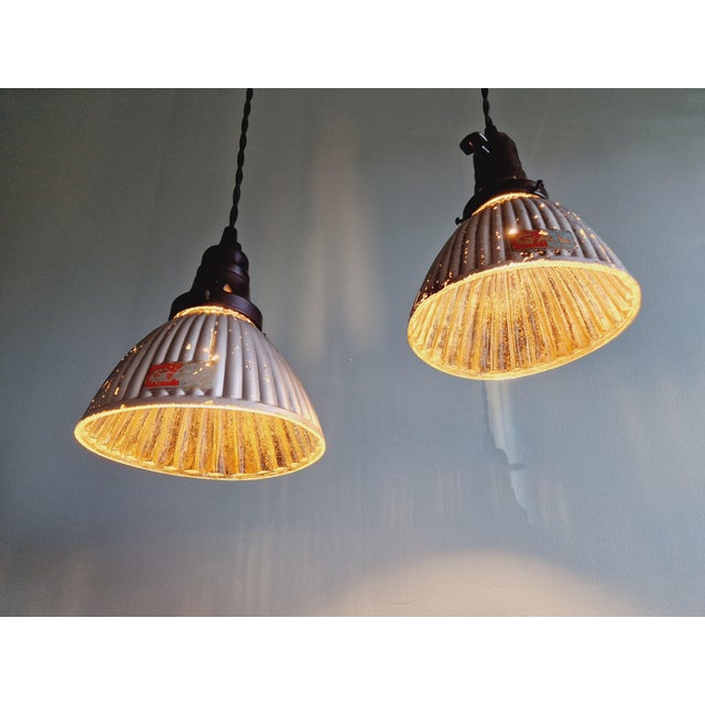 Set of 3 mercury glass pendants produced by the french manufacturer gal in the 1930s. Each of the pendants has been re-...