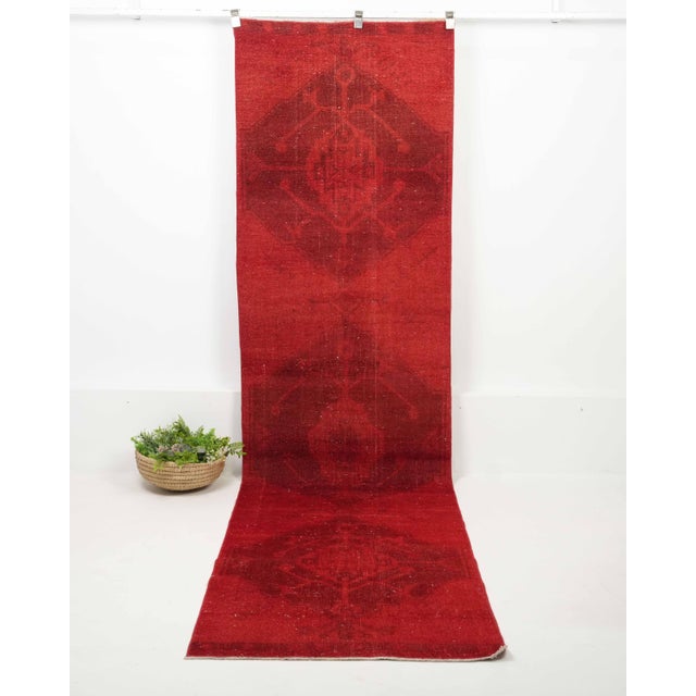 Vintage Turkish Hand-Knotted Runner rug is a semi-antique vintage runner rug. The '70s Eastern region of Anatolian's...