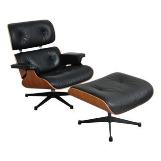 Set of Lounge Chair and Ottoman in Black Leather by Charles and Ray Eames, 2000s For Sale