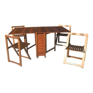 Mid-Century Modern Romanian Drop Leaf Table on Casters With 4 Hideaway Chairs - 5 Pieces For Sale