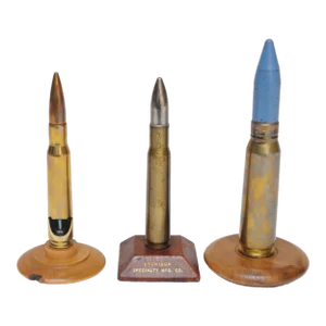 Set of Three Vintage Trench Art Bullet Casing Paperweights and Flint Lighter