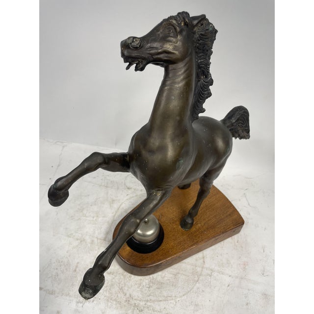 Beautiful Prancing Horse Sculpture, made of Bronze, with large Solid Walnut Base and Reception Bell above it. Art Nouveau...