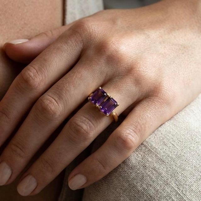 Regal, enchanting, and deeply captivating, this exquisite Toi et Moi ("You and Me") ring features a striking dual layout...
