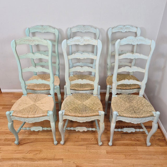 This is a beautiful assembled set of 6 French country style pale blue-green painted ladder back rush seat dining chairs by...