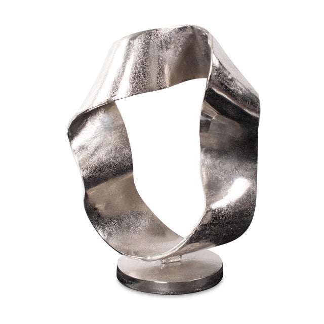 Crafted using ancient metalworking techniques in cast aluminum. This modern design emphasizes flowing lines and shapes,...