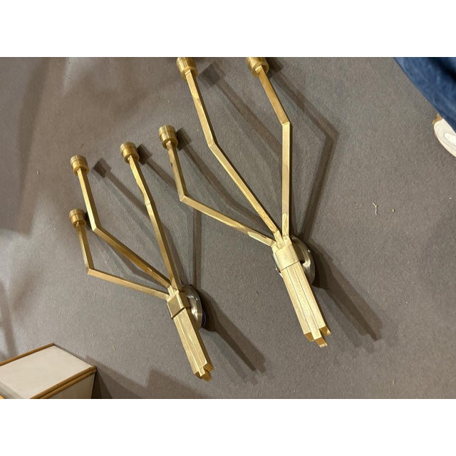 A spectacular pair of satin-finish brass wall lamps, statuesque and eclectic. Made in Italy in the 1990s. European Plug...