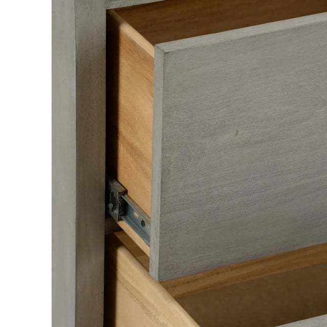 Display treasures or place a drink on the stunning Moxy Bedside Table. Finished in a lovely gray with geometric silver...