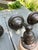 Old Lights On is pleased to offer this set of three antique brass wall sconces with vintage glass globes. They are wired...