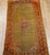 An exquisite antique Turkish Oushak area rug from the late 19th century, showcasing the masterful artistry of the...