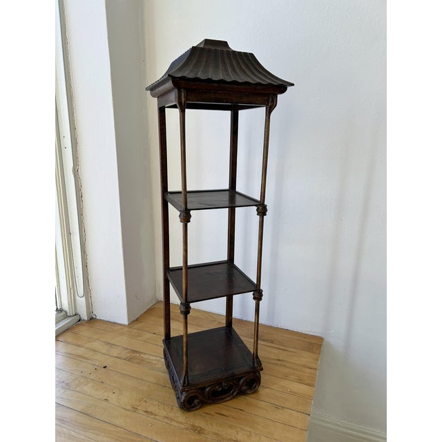 3-tier, vintage etagere with pagoda-style details including fluted, hip "roof" and scroll base. A striking display for a...