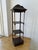 3-tier, vintage etagere with pagoda-style details including fluted, hip "roof" and scroll base. A striking display for a...