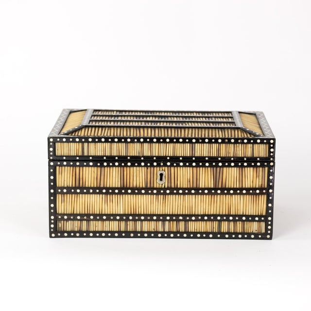 A large scale Anglo Indian Porcupine quill and ebony spice box with a fully fitted interior, Circa 1870. A handsome...