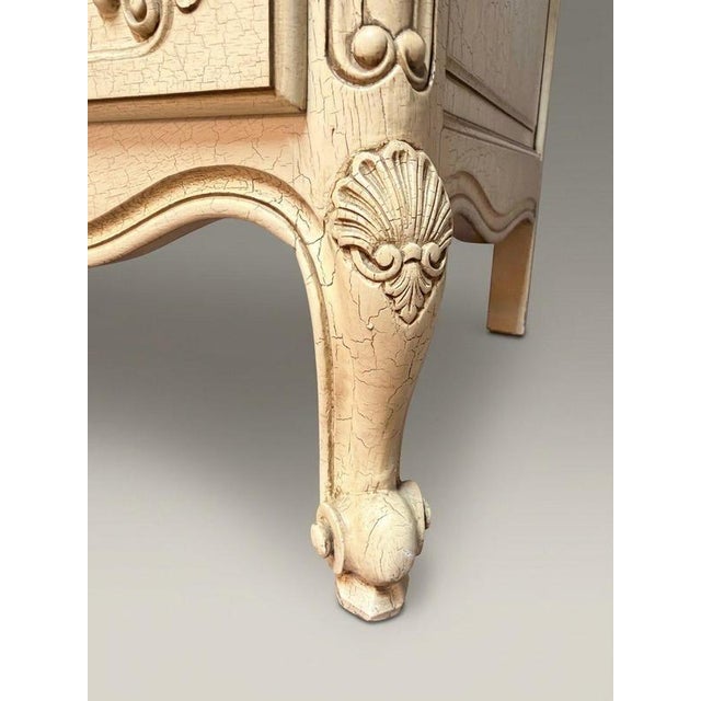 Elevate your space with this exceptional example of 20th-century French chest of drawers. This elegant three-drawer...
