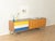 Exclusive Mid-Century Sideboard accomplished design: perfect proportions and discernible attention to detail high-quality...