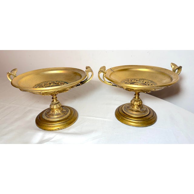 Up for sale is an exquisite pair of antique 19th century gold gilded bronze tazzas. They features a very intricate dual...