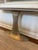 CB2 Pool White Marble Console Table Polished rectangular marble top floats above a silver pedestal to form this cool...