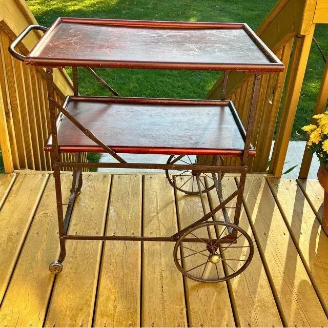 An incredible two-tiered industrial bar cart made in approximately 1914-1917 by the Fulton Manufacturing Company in Bay...