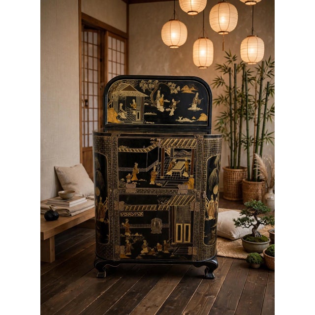 A black lacquered Chinese bar cabinet, a classic example of antique oriental furniture or Chinoiserie style. Hand painted,...