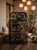 A black lacquered Chinese bar cabinet, a classic example of antique oriental furniture or Chinoiserie style. Hand painted,...
