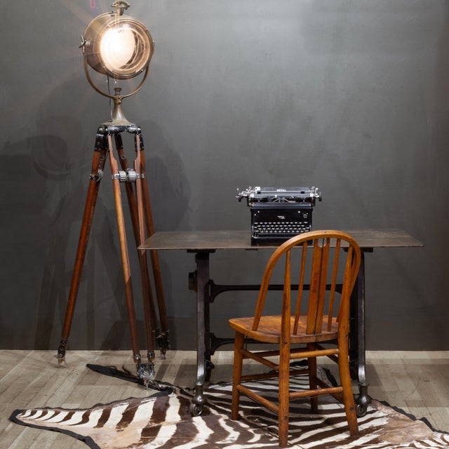 ABOUT An industrial cast iron and steel drafting table on metal casters. A high-quality reproduction capturing the...