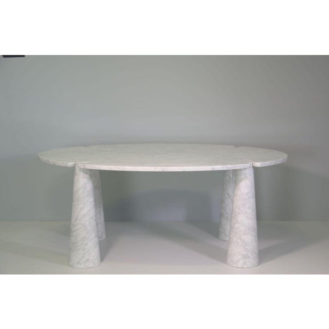 Rare large dining table by Angelo Mangiarotti for Skipper in Carrara marble, with original label. This piece has an...