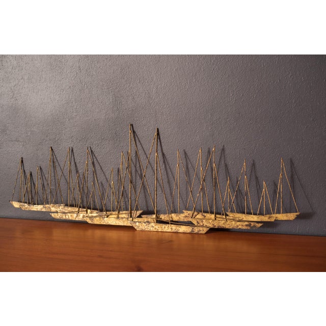 Vintage California studio sailboat wall hanging sculpture labeled J. G. Ortman, circa 1970's. This decorative nautical...