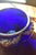 A beautiful antique French jardinière featuring a rich cobalt blue glass body adorned with finely detailed gilt bronze...
