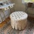 Listing is for a tufted ottoman in winter white upholstery fabric with gilt Napoleonic bee fabric pattern all over. The...