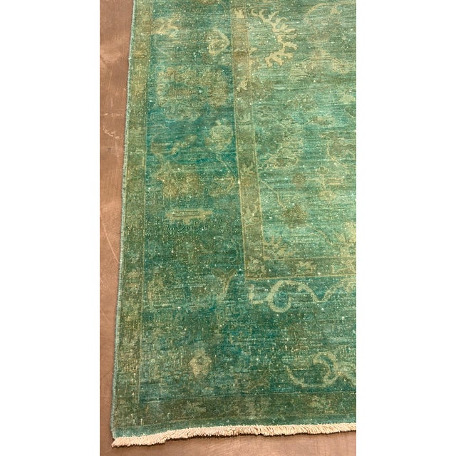 vintage hand knotted rug in unusual color combination.