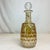 We love the Honeycomb design of this antique decanter. It’s enhanced with the golden colored glass. It has a cork lined...
